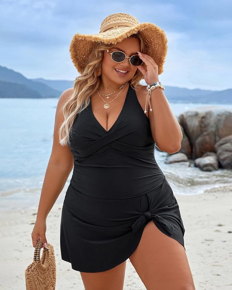 plus size swim dress, tummy control swimwear, one piece swim dress, crisscross back swimsuit, v neck swim dress, adjustable swim dress, ruched swimsuit, women's swim skirt, swimsuits for women, bathing suits for women, plus size bathing suits, swimwear, plus size swimsuits, swim dresses for women