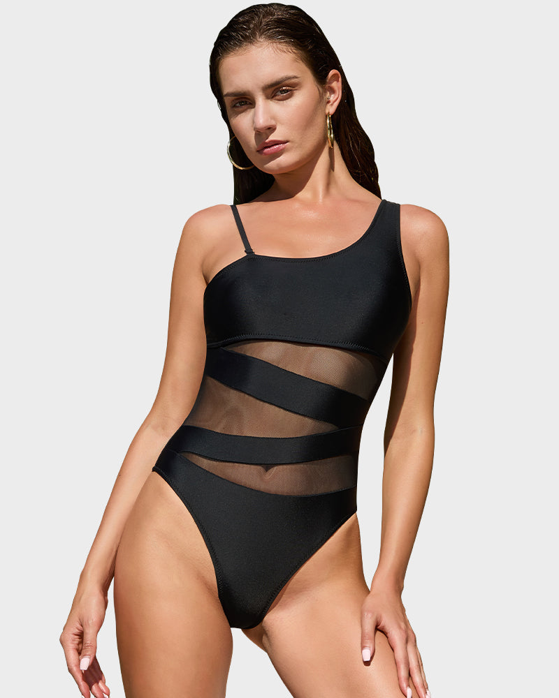 one shoulder swimsuit, mesh insert swimsuit, high cut swimsuit, black one piece swimsuit, asymmetrical swimsuit, high leg swimsuit, elegant one piece swimsuit, chic swimwear, fashionable swimsuit, pool party swimsuit, stylish asymmetrical swimsuit, modern black swimsuit, summer chic swimwear, trendy poolside swimsuit, sophisticated beachwear, elegant swim fashion, fashionable pool party look