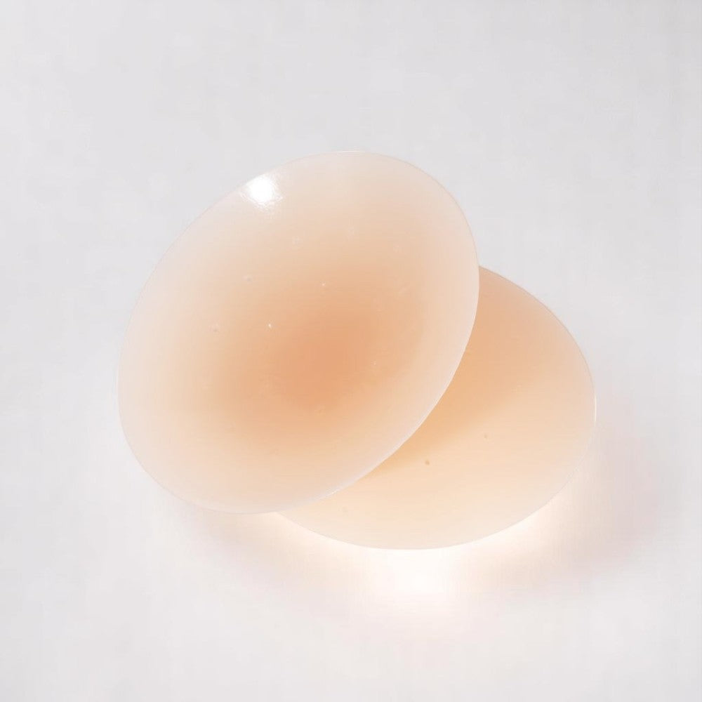 reusable nipple covers, silicone nipple covers, adhesive nipple covers, waterproof nipple covers, skin tone nipple covers, invisible nipple covers, reusable pasties, nipple covers for women, seamless nipple covers, silicone pasties, best reusable nipple covers, best silicone nipple covers, sticky nipple covers