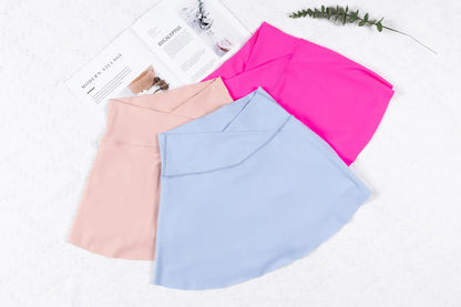tennis skirt, high waist tennis skirt, tennis skirt with shorts, built in shorts skirt, flared tennis skirt, workout tennis skirt, gym clothes, workout clothes, tennis skirt for women, athletic skirt, tennis apparel, activewear skirt, sports skirt, comfy tennis skirt, fitness clothing, breathable sports skirt, training skirt, women's sport skirt, stylish tennis outfit, flexible tennis skirt
